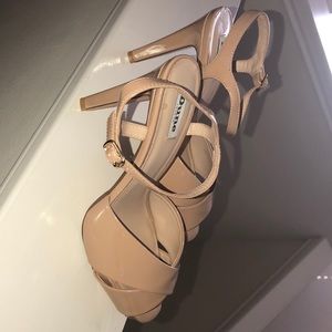 Tan toe pumps